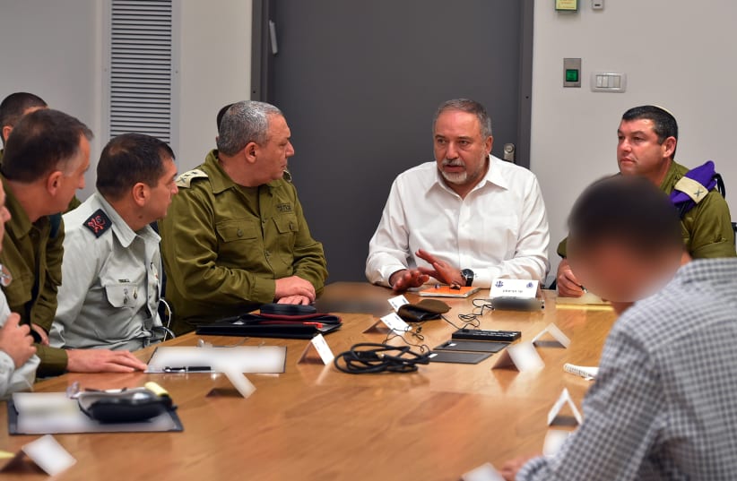 Defense Minister Avigdor Liberman and other top IDF personnel in a security meeting in Tel Aviv  on Sunday, November 11. (photo credit: ARIEL HERMONI/DEFENSE MINISTRY)