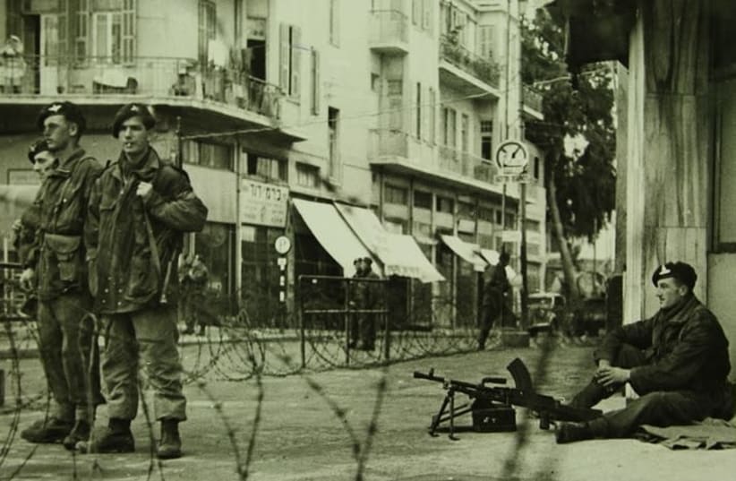 British soldiers enforcing a curfew in Tel Aviv during the 1940s (Haim Fein at the Emanuel Harussi Photograph Collection) (photo credit: NATIONAL LIBRARY OF ISRAEL)