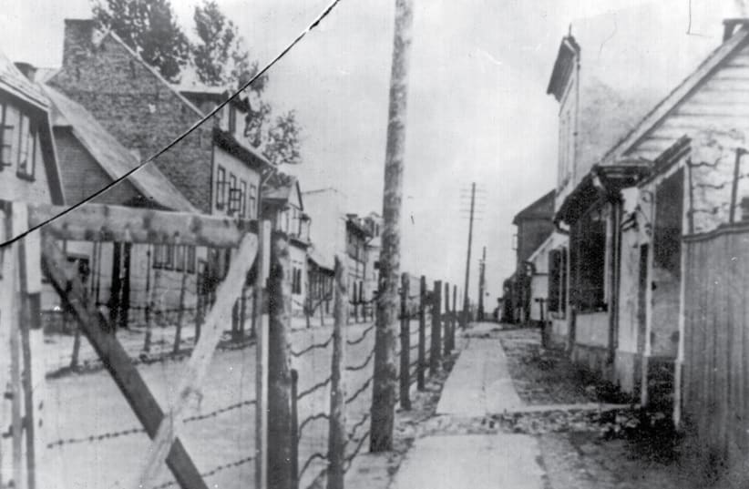 A BARBED-wire fence along Panrow Street, separating the two parts of the Kovno ghetto in Lithuania. (photo credit: COURTESY: YAD VASHEM PHOTO ARCHIVE)