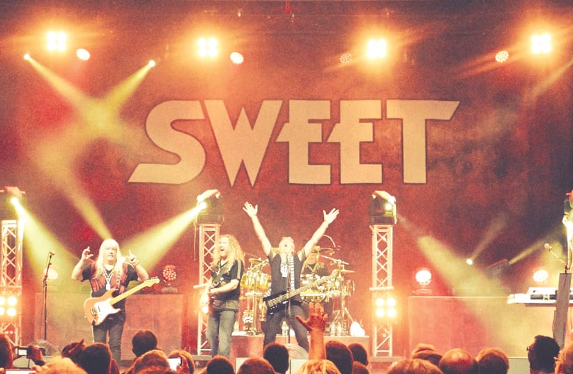 THE SWEET’S Andy Scott (left): I wouldn’t want to be the band that goes on after us (photo credit: Courtesy)