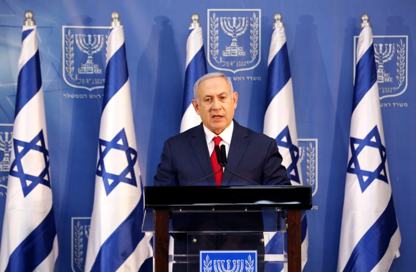 Prime Minister Benjamin Netanyahu delivers a statement to the members of the media in Tel Aviv (photo credit: CORINNA KERN/REUTERS)