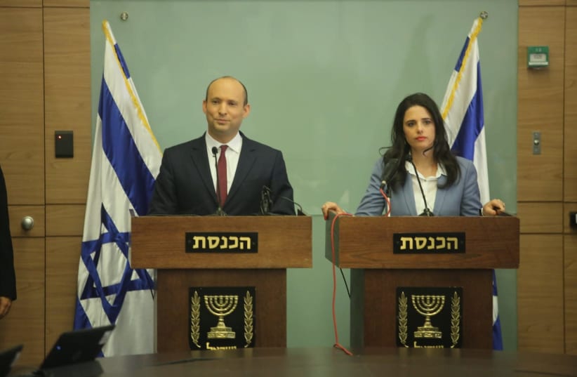 Naftali Bennett and Ayelet Shaked address the media, November 19, 2018 (photo credit: MARC ISRAEL SELLEM/THE JERUSALEM POST)