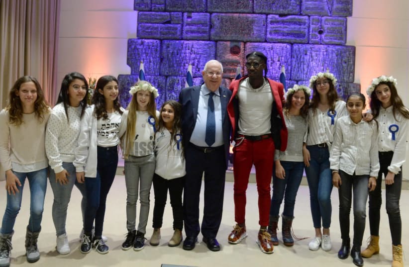 Rivlin hosted a  bar- and batmitzvah event for children of families affected in terrorist attacks. (photo credit: MARK NEIMAN)