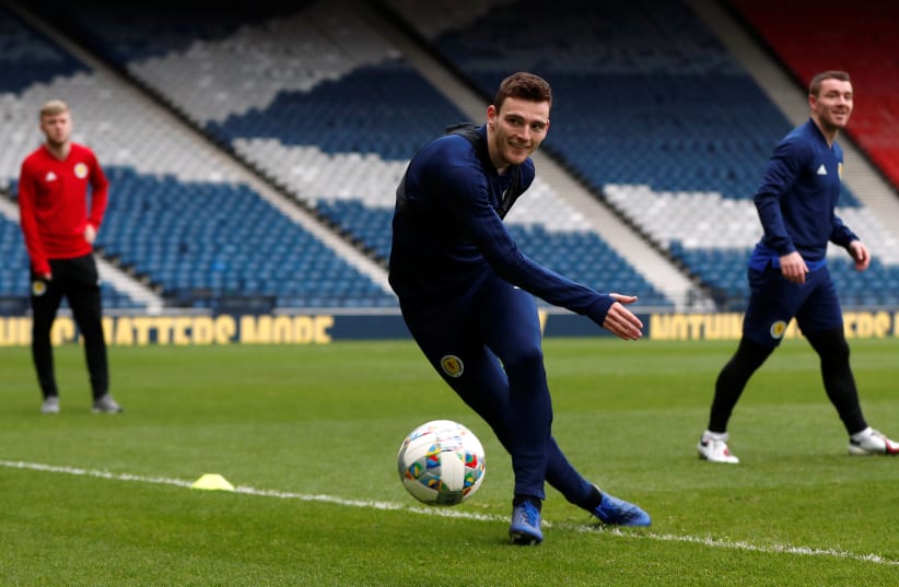 SCOTLAND’S ANDREW ROBERTSON prepares for the match against Israel yesterday at Hampden Park, in Glasgow.  (photo credit: ACTION IMAGES / LEE SMITH VIA REUTERS)