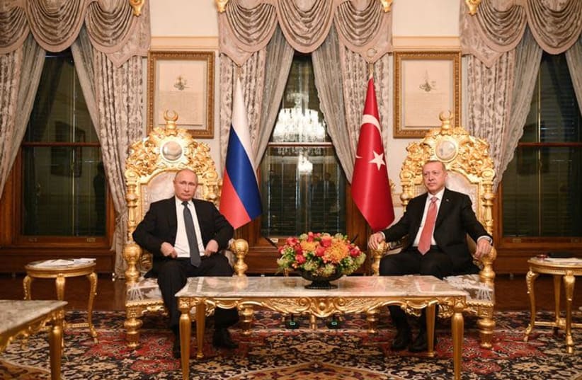 Russian President Vladimir Putin (L) meets with his Turkish counterpart Tayyip Erdogan in Istanbul, Turkey November 19, 2018 (photo credit: SPUTNIK/RAMIL SITDIKOV/POOL VIA REUTERS)