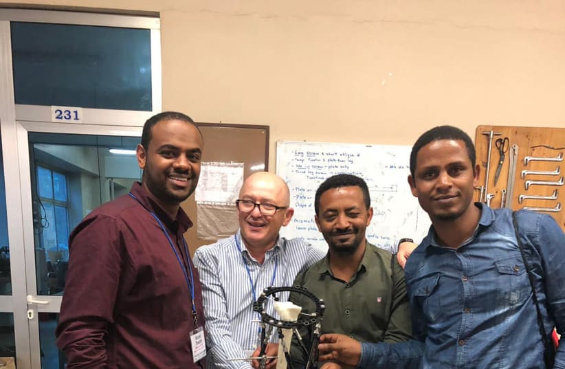 Professor Mark Eidelman, 2nd from left, director of the Pediatric Orthopedics Unit at Rambam’s Ruth Rappaport Children’s Hospital with Africian colleagues at The Black Lion Hospital in Addis Ababa. (photo credit: RAMBAM MEDICAL CENTER)