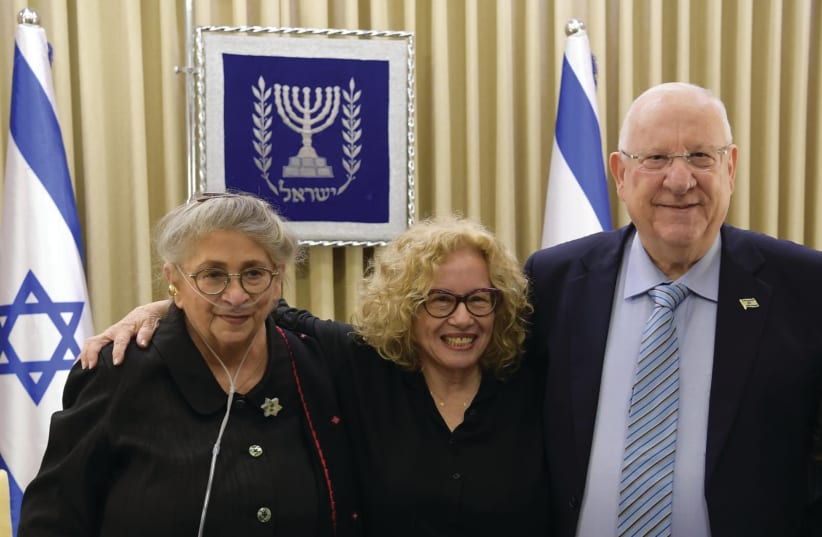 CHAVA ALBERSTEIN, flanked by President Reuven Rivlin and his wife, Necham (photo credit: MARC NEYMAN/GPO)