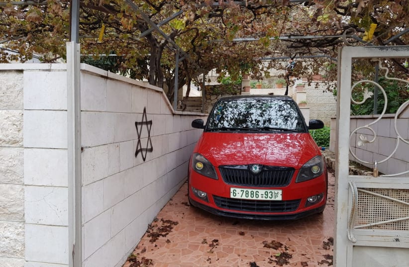 A vandalized car in the Palestinian village of Huwwara (photo credit: YESH DIN)
