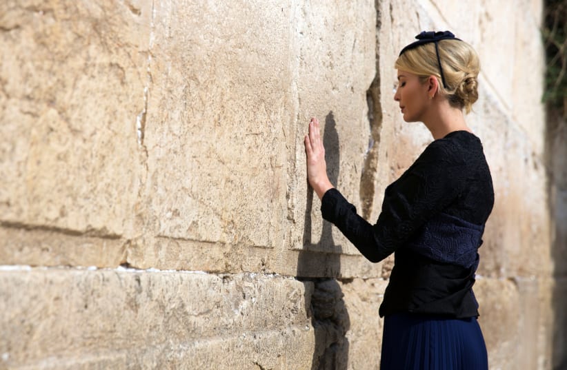 Ivanka Trump prays as she touches the Western Wall, Judaism's holiest prayer site, in Jerusalem's Old City May 22, 2017 (photo credit: HEIDI LEVINE/POOL/REUTERS)