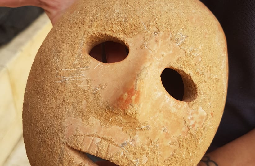 9,000-year-old stone mask discovered in southern Hebron Hills (photo credit: ANTIQUITIES AUTHORITY)