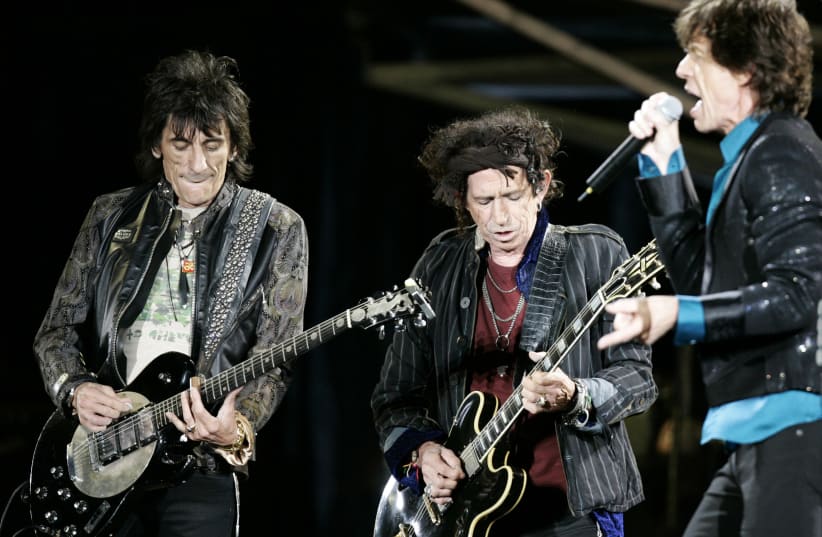 Rolling Stones Ron Wood (L), Keith Richards (C) and Mick Jagger perform during a concert on the band's "A Bigger Bang" European tour in Warsaw, July 25,2007 (photo credit: KASPER PEMPEL/REUTERS)