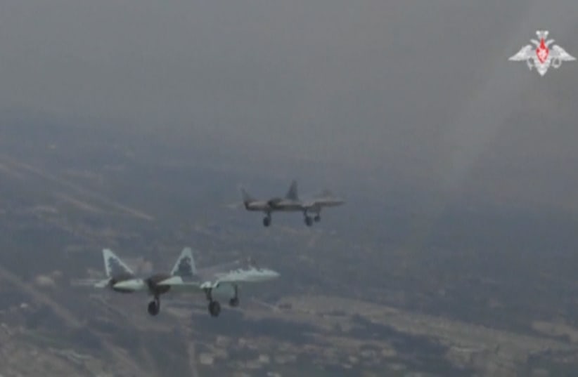 A still image, taken from a video footage and released by Russia's Defence Ministry on November 19, 2018, shows Sukhoi Su-57 jet fighters during a flight in Syria (photo credit: RUSSIAN DEFENSE MINISTRY/HANDOUT VIA REUTERS)