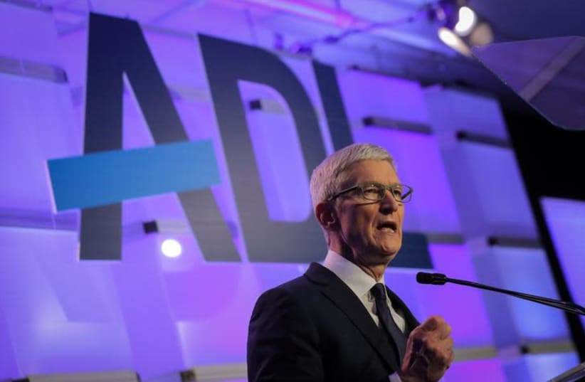 Apple CEO Tim Cook speaks at the Anti-Defamation League's "Never is Now" summit in New York City, New York, U.S., December 3, 2018 (photo credit: REUTERS/BRENDAN MCDERMID)