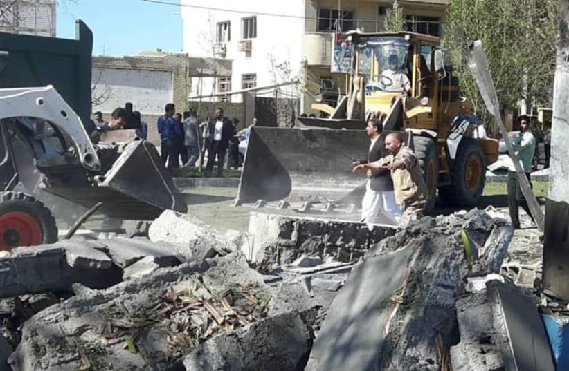 General view of damages after a bomb inside a car exploded outside a police station in Chabahar, Iran December 6, 2018 (photo credit: TASNIM NEWS AGENCY/HANDOUT VIA REUTERS)