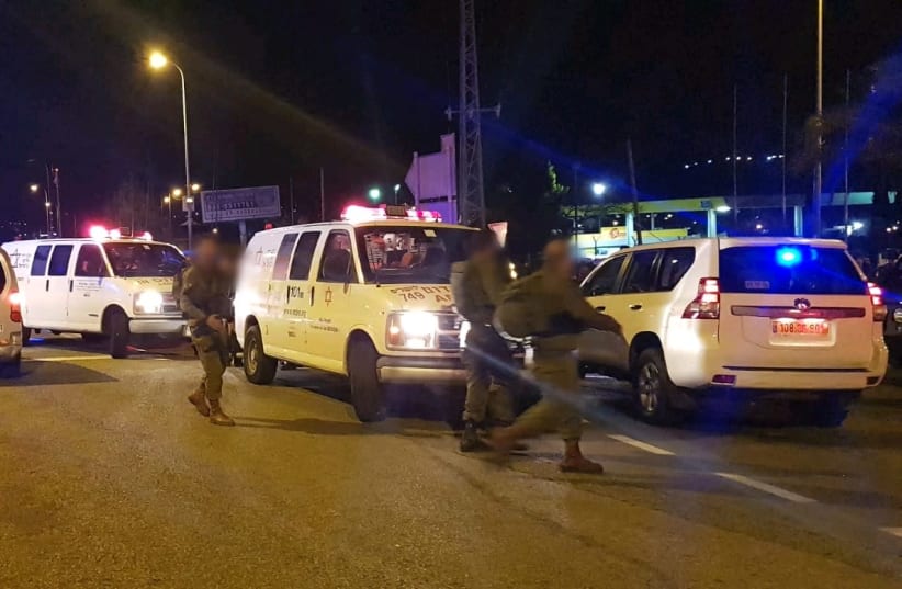 Ambulances gather after six injured in a shooting by Ofra, near Jerusalem. (photo credit: MDA)