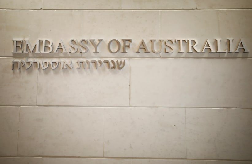 A Hebrew and English sign is seen at the entrance to the Australian Embassy in Tel Aviv, Israel, October 16, 2018 (photo credit: REUTERS/AMIR COHEN)