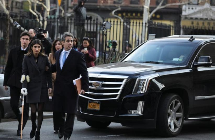 Michael Cohen, U.S. President Donald Trump's former attorney, arrives for his sentencing at United States Court house in the Manhattan borough of New York City, New York, U.S., December 12, 2018 (photo credit: JEENAH MOON/REUTERS)