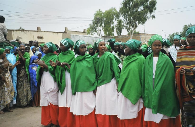 Women in the Somaliland, wearing the colors of the Somaliland flag, prior to parliamentary elections in 2005. (photo credit: F.OMER/ WIKIMEDIA COMMONS)