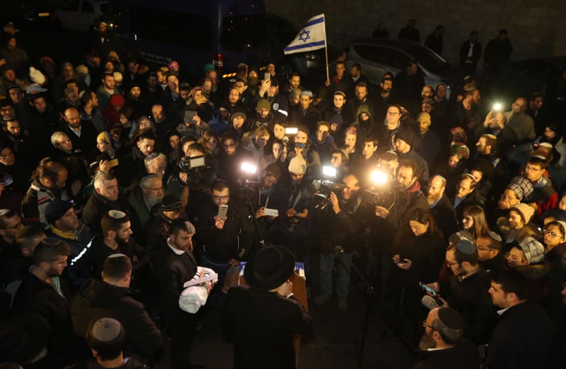The baby that died after the Ofra attack (bottom left) being laid to rest at the Mount of Olives cemetry, December 12th, 2018 (photo credit: MARC ISRAEL SELLEM/THE JERUSALEM POST)