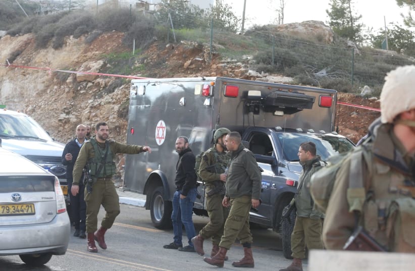 Scene of Givat Asaf shooting attack (photo credit: MARC ISRAEL SELLEM/THE JERUSALEM POST)