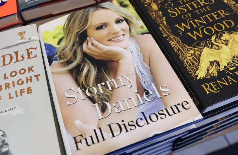 The book "Full Disclosure" by Stormy Daniels is seen for sale in Manhattan, New York, U.S., October 2, 2018.  (photo credit: SHANNON STAPLETON / REUTERS)