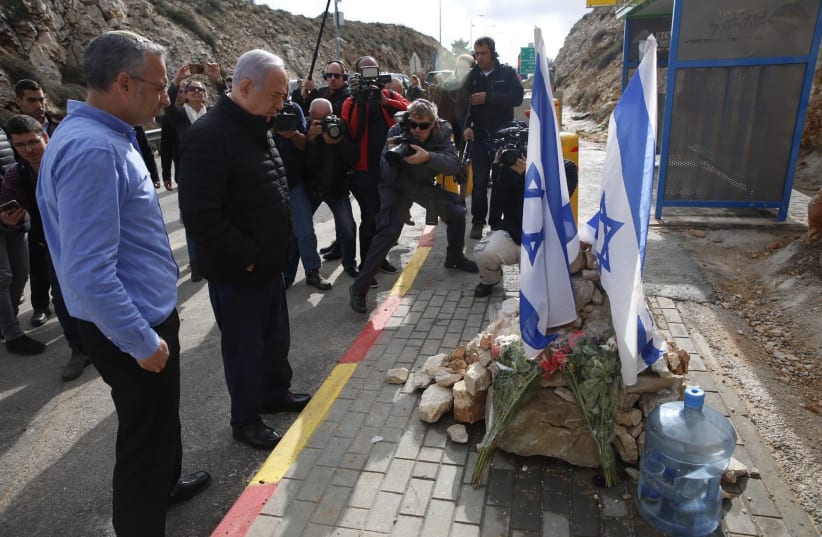 Prime Minister Benjamin Netanyahu at the site of terror attack near Bet El, December 18, 2018 (photo credit: TOMER APPELBAUM)