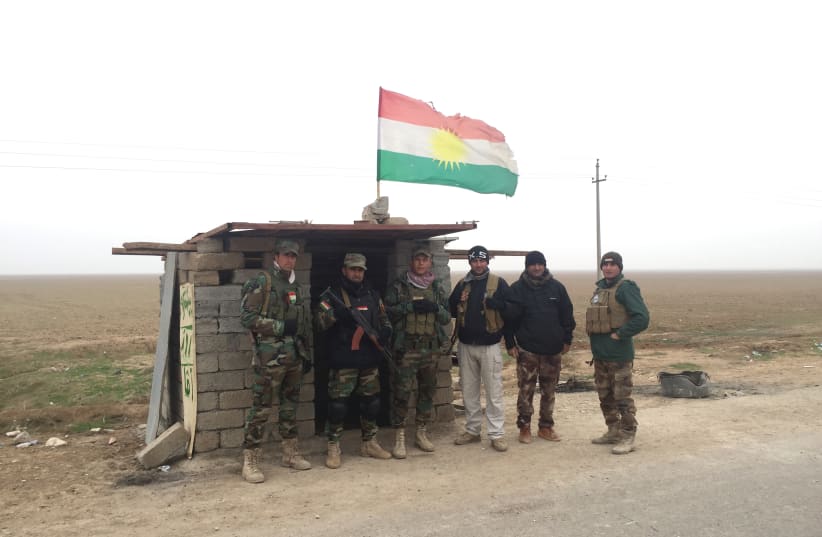 ROJAVA PESHMERGA troops guard a road in northern Iraq in December 2015. (photo credit: SETH J. FRANTZMAN)