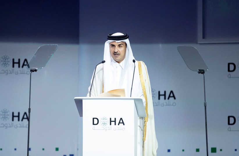 Amir of Qatar Sheikh Tamim bin Hamad bin Khalifa Al-Thani speaks during Doha Forum in Doha, Qatar, December 15, 2018.  (photo credit: QATAR NEWS AGENCY/HANDOUT VIA REUTERS)