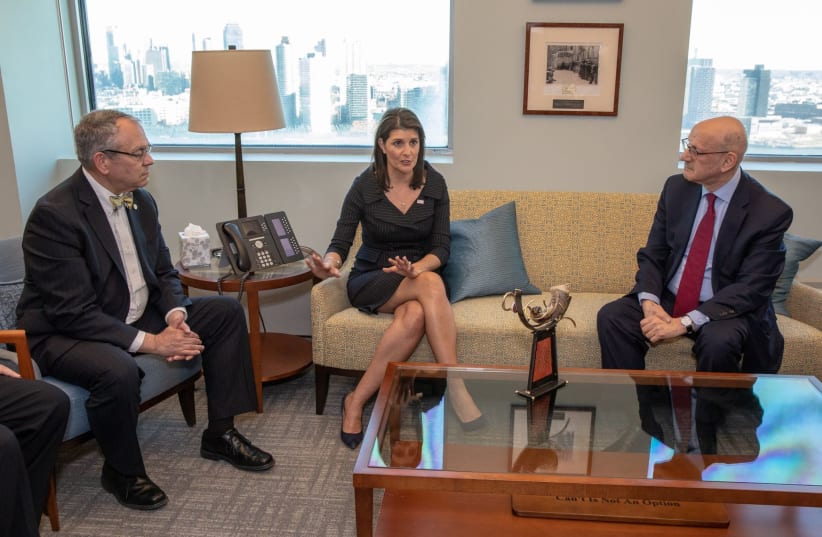 B'nai B'rith International President Charles O. Kaufman and CEO Daniel S. Mariaschin speak with Nikki Haley at the private event held at the United States Mission to the United Nations located in New York (photo credit: B'NAI B'RITH INTERNATIONAL)