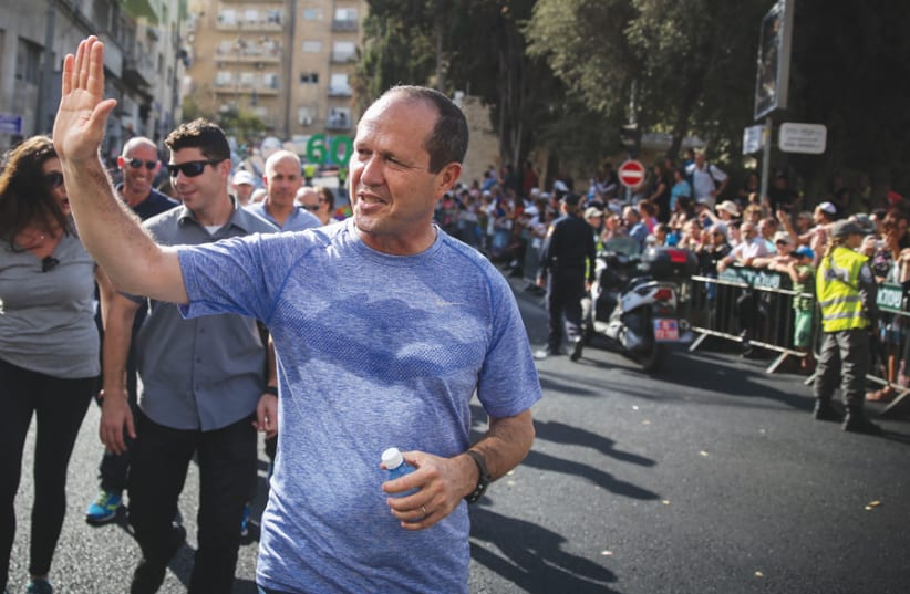 A distance runner himself, in 2011 Nir Barkat successfully launched the first Jerusalem Marathon. (photo credit: Courtesy)