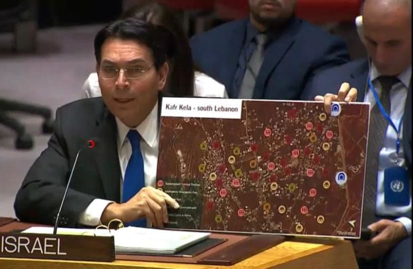 Israel's Ambassador in the U.N. Danny Dannon presenting a photograph of Hezbollah terror tunnels and bases in Lebanon    (photo credit: COURTESY OF THE ISRAELI MISSION AT UN)