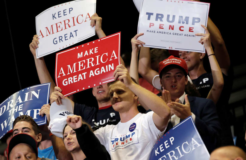 Supporters of U.S. President Donald Trump attend a rally in Springfield, Missouri, September 21, 2018. Picture taken September 21, 2018 (photo credit: REUTERS/MIKE SEGAR)