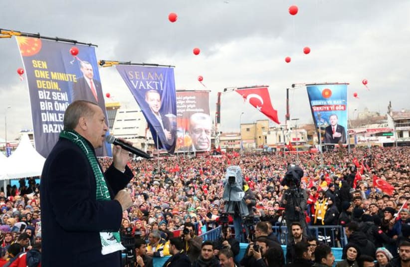 Turkish President Tayyip Erdogan addresses his supporters in Konya, Turkey, December 17, 2018. (photo credit: REUTERS ATTENTION EDITORS)
