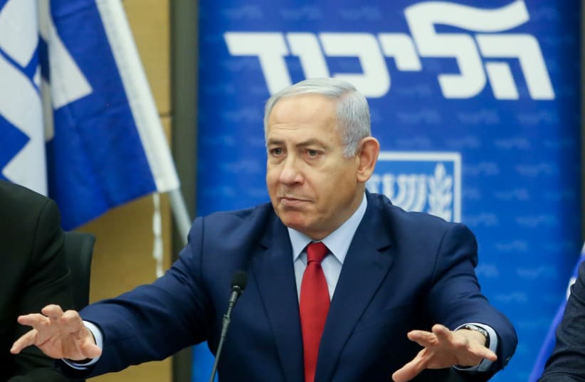 Netanyahu speaks at a coalition faction meeting (photo credit: MARC ISRAEL SELLEM)