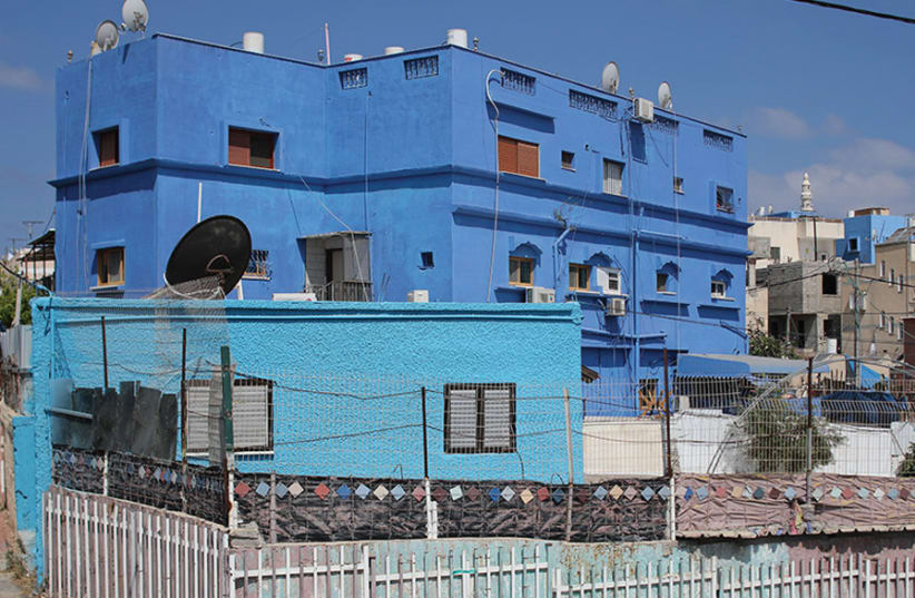 FEELING BLUE: Some of the houses that were painted thanks to Anat Cohen Halevi’s initiative. (photo credit: ANAT COHEN HALEVI)