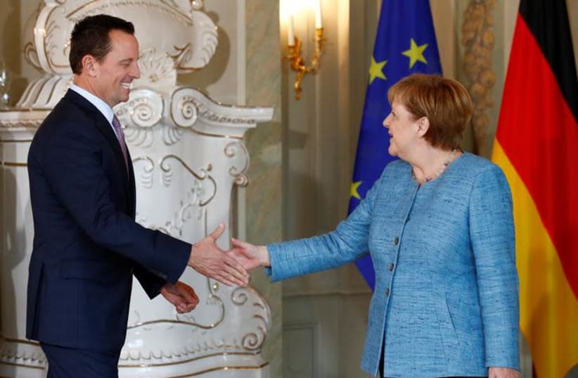 German Chancellor Angela Merkel receives the ambassador of U.S. to Germany, Richard Grenell, in Meseberg, Germany July 6, 2018. (photo credit: AXEL SCHMIDT/REUTERS)