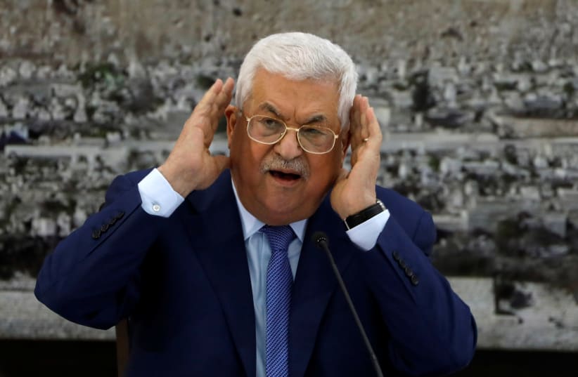 PALESTINIAN PRESIDENT Mahmoud Abbas – not saying anything about the elections, but working behind the scenes? (photo credit: MOHAMAD TOROKMAN/REUTERS)