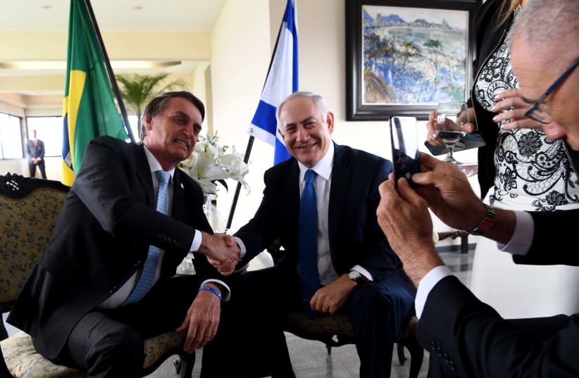 Prime Minister Benjamin Netanyahu and Brazilian President Jair Bolsonaro  (photo credit: AVI OHAYON - GPO)