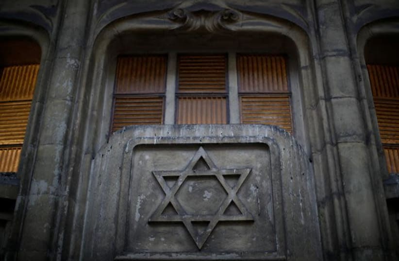 The Star of David is seen on the facade of a synagogue in Paris France, December 10, 2018. (photo credit: REUTERS/GONZALO FUENTES)