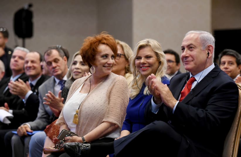 Prime Minister Benjamin Netanyahu and Sara Netanyahu meet with Christian friends of Israel in Rio de Janeiro, Brazil on December 30, 2018 (photo credit: AVI OHAYON - GPO)