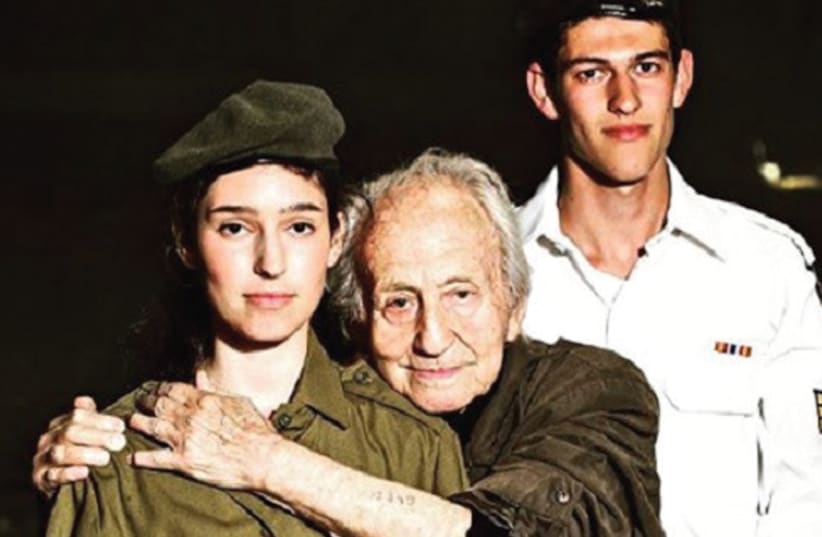 Noah Klieger with his two grandchildren serving in the IDF (photo credit: Courtesy)