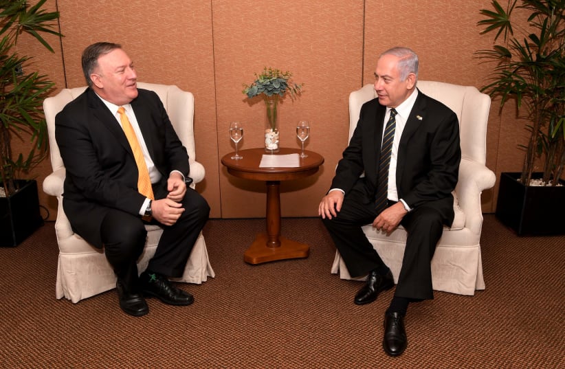 Prime Minister Benjamin Netanyahu [R] with US Secretary of state Mike Pompeo [L].  (photo credit: AVI OHAYON - GPO)