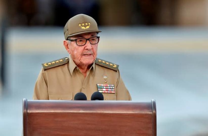 Cuban First Secretary of Communist Party Raul Castro Ruz gives a speech, on January 01, 2019, during the celebration of 60th Anniversary of Cuban Revolution at Santa Ifigenia Cemetery in Santiago de Cuba. At back, the Fidel Castro's tomb. (photo credit: REUTERS)