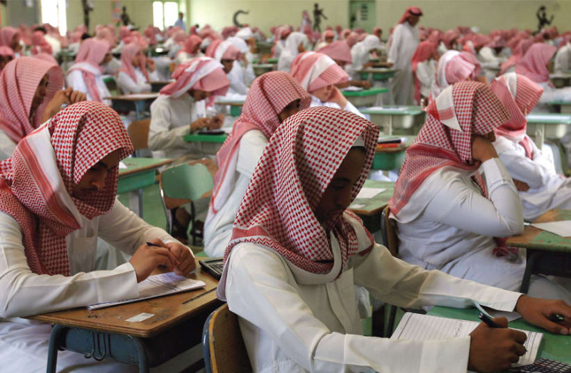 SECONDARY STUDENTS sit for an exam in a government school in Riyadh. (photo credit: FAHAD SHADEED/ REUTERS/ FILE PHOTO)