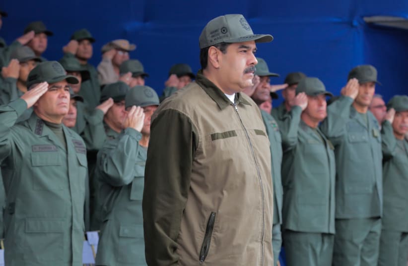 Venezuela's President Nicolas Maduro attends the end of the year ceremony with members of the Bolivarian National Armed Forces in Caracas, Venezuela December 28, 2018. Picture taken December 28, 2018. (photo credit: MIRAFLORES PALACE/HANDOUT VIA REUTERS)