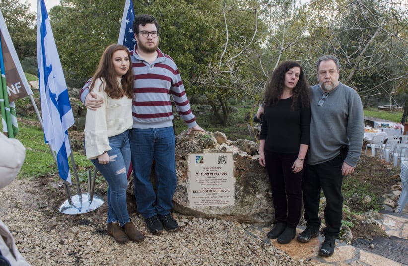 L-R: Dana, Michael, Renee and David Goldenberg next to the sign dedicating Ellie's Oak Tree Corner in Kerem HaCarmel Forest (photo credit: DENNIS ZINN/KKL-JNF)