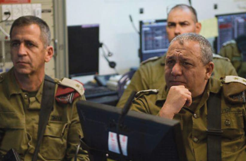 PASSING THE torch: Successor Aviv Kochavi (left) with Eisenkot. (photo credit: IDF)