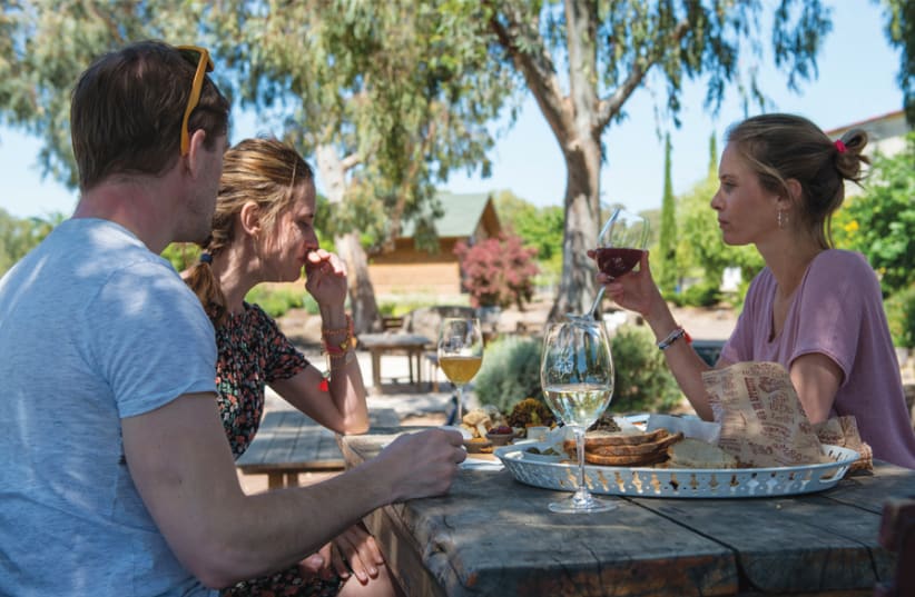 GUESTS AND visitors enjoy homemade delights from the AdiKa Café. (photo credit: Courtesy)