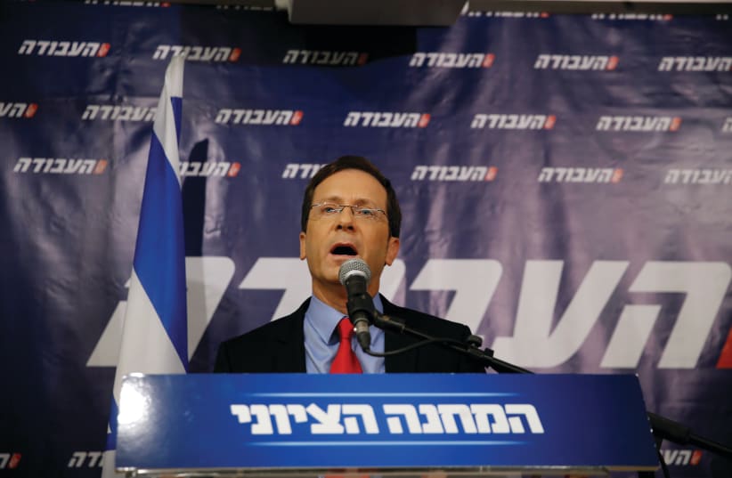 ISAAC HERZOG, former leader of Zionist Union, delivers a statement at the party headquarters in Tel Aviv, Israel, in 2016.  (photo credit: REUTERS/BAZ RATNER)