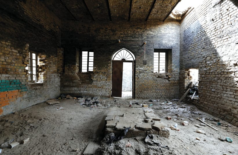 THE INTERIOR remains of a synagogue are seen in the center of Baghdad (photo credit: WISSIM AL-OKILI/REUTERS)